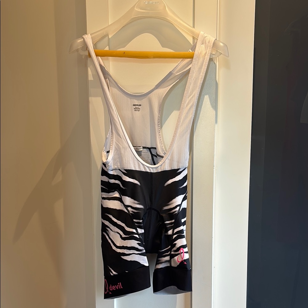 Dixie DevilBlack and White Cycling Bib Shorts and Jersey with Pink Detail